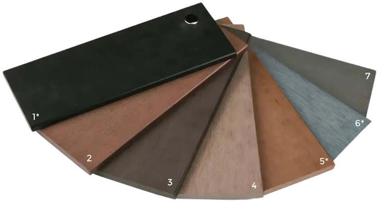 Composite decking colour range including charcoal, wild brown, husk, teak, dust yellow, salt lake silver and misty grey boards.