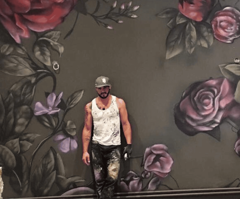 Large-scale floral mural created by Nomad Gallery